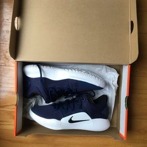 Navy Nike running shoes.
